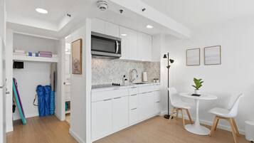 Fridge, microwave, stovetop, coffee/tea maker