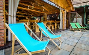 Outdoor dining - Forest house with private wellness, pool, and activities for the whole family. (Klenovnik)