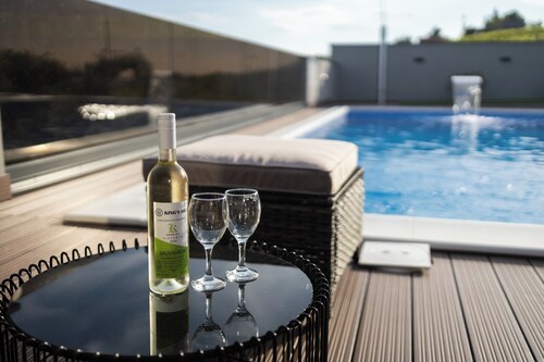 Luxury villa with jacuzzi, sauna and pool surrounded by vineyards