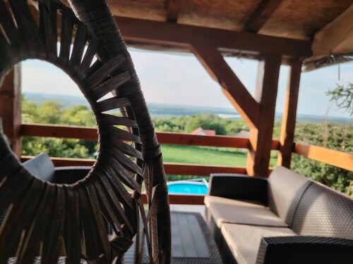 Family-friendly countryside retreat with pool, jacuzzi, playground, and Danube views.