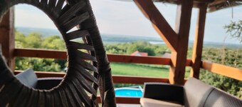 Family-friendly countryside retreat with pool, jacuzzi, playground, and Danube views.