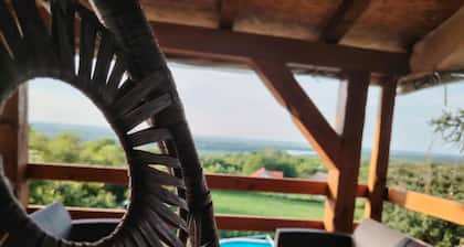 Family-friendly countryside retreat with pool, jacuzzi, playground, and Danube views.