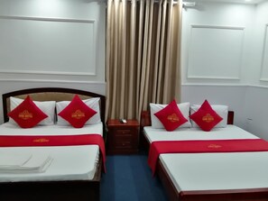 Superior Quadruple Room | Blackout drapes, soundproofing, iron/ironing board, free WiFi - Xumi Motel (Hoang Mai)