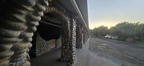 Property grounds - Private oasis with pool, outdoor bar, horses, river access & pyramid. (Sanger)