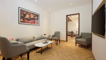 Suite | Living area | 55-inch flat-screen TV with satellite channels