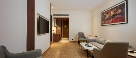 Suite, 1 King Bed | Minibar, in-room safe, desk, laptop workspace