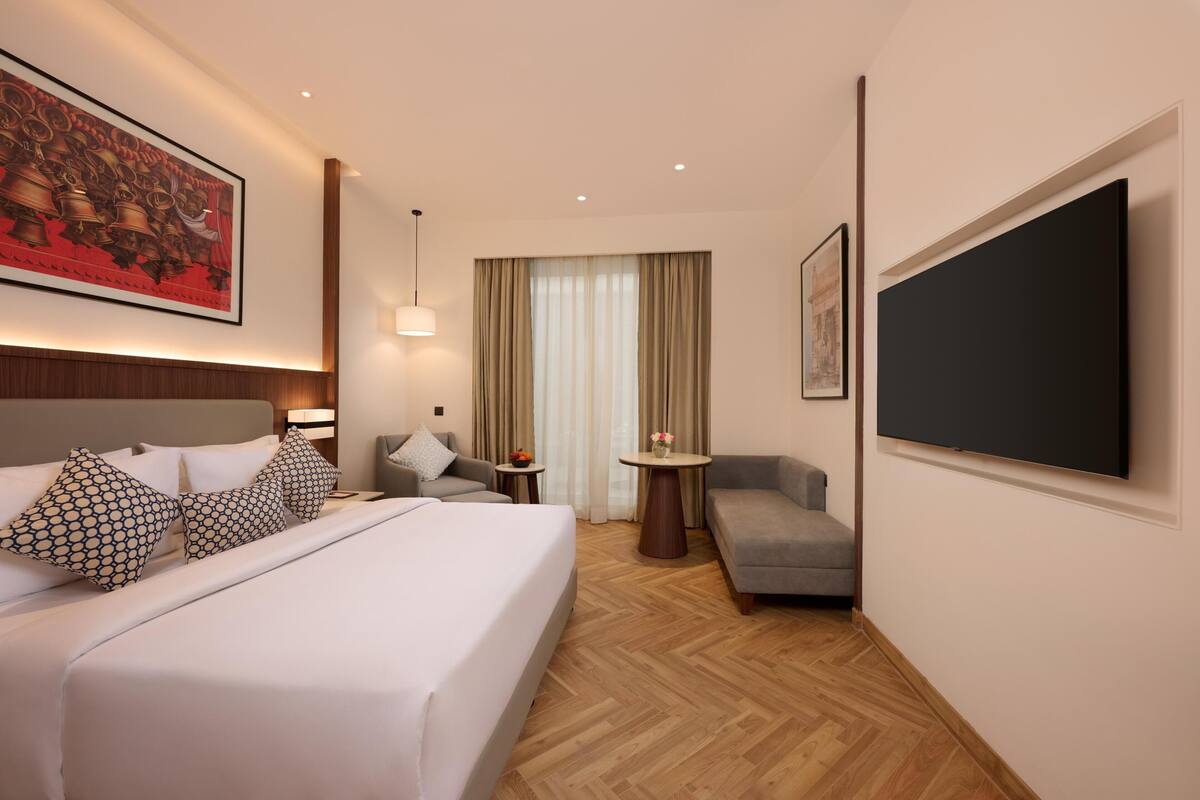 Habitación Premium, 1 cama King size, balcón | Minibar, caja de seguridad en la habitación y escritorio