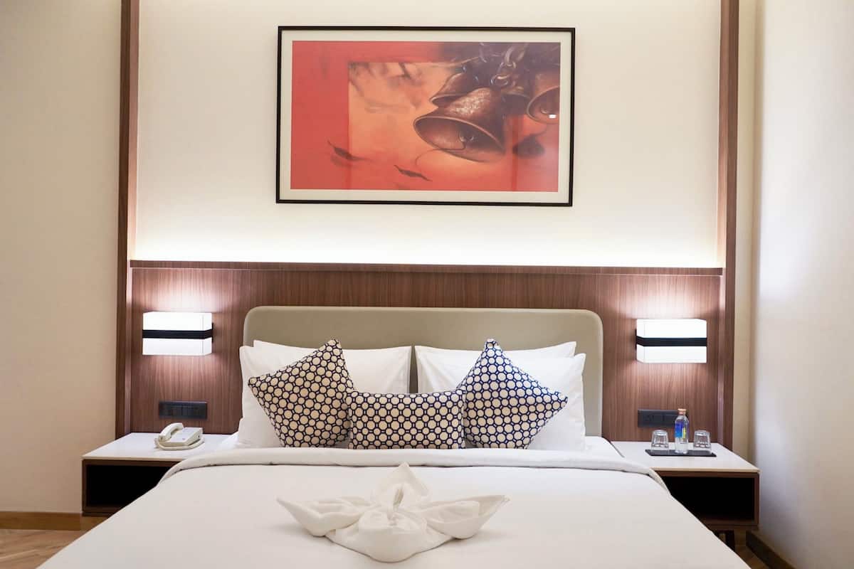 Premium Double Room With Balcony | Minibar, desk, laptop workspace, blackout drapes