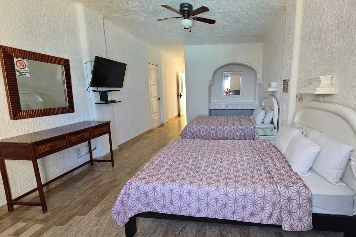 Economy Studio, Pool View | Laptop workspace, iron/ironing board, free WiFi