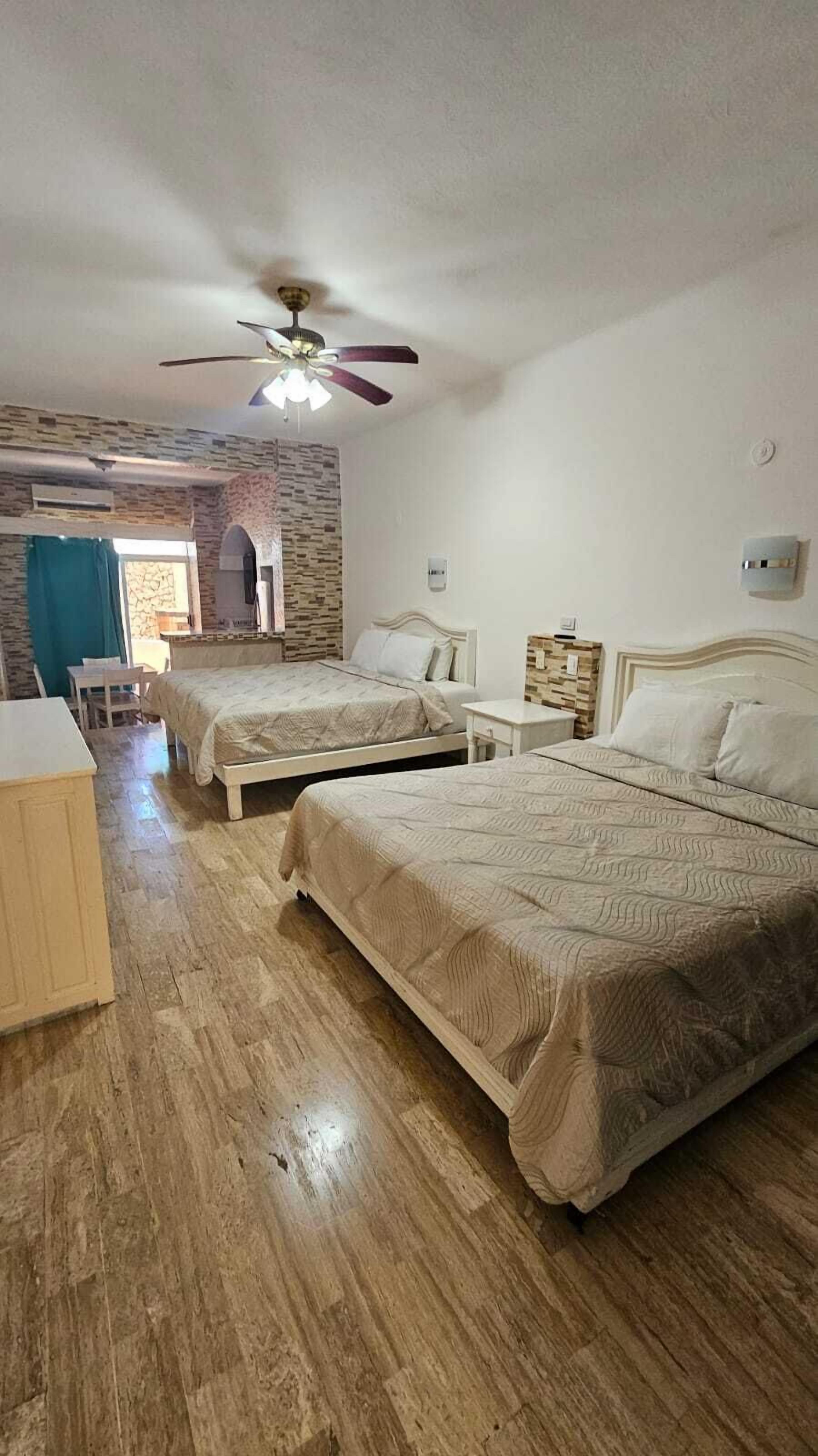 Junior Studio Suite, Balcony | Laptop workspace, iron/ironing board, free WiFi