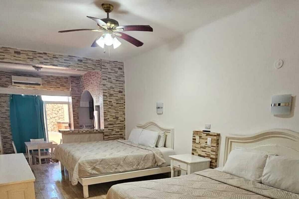 Junior Studio Suite, Balcony | Laptop workspace, iron/ironing board, free WiFi