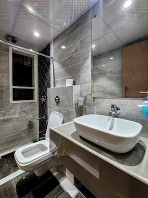 Shower, towels, soap, shampoo