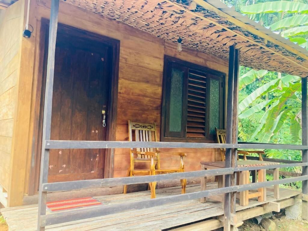 Habitación doble Deluxe, balcón, vista al jardín | Terraza o patio