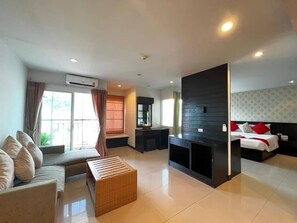 Junior Studio, Balcony | Living area | Flat-screen TV - Amara APK Resort and Spa (Pa Tong)