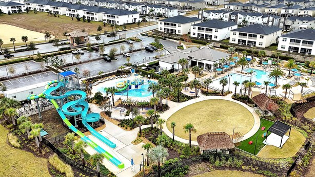 A residential area with a swimming pool, water slides, and a tennis court. - 1085 Leader ST, Davenport,5 BED (Davenport)