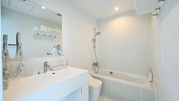 Hair dryer, towels, soap, toilet paper