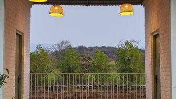 Deluxe Double Room, 1 King Bed, Balcony, Hill View | Property grounds