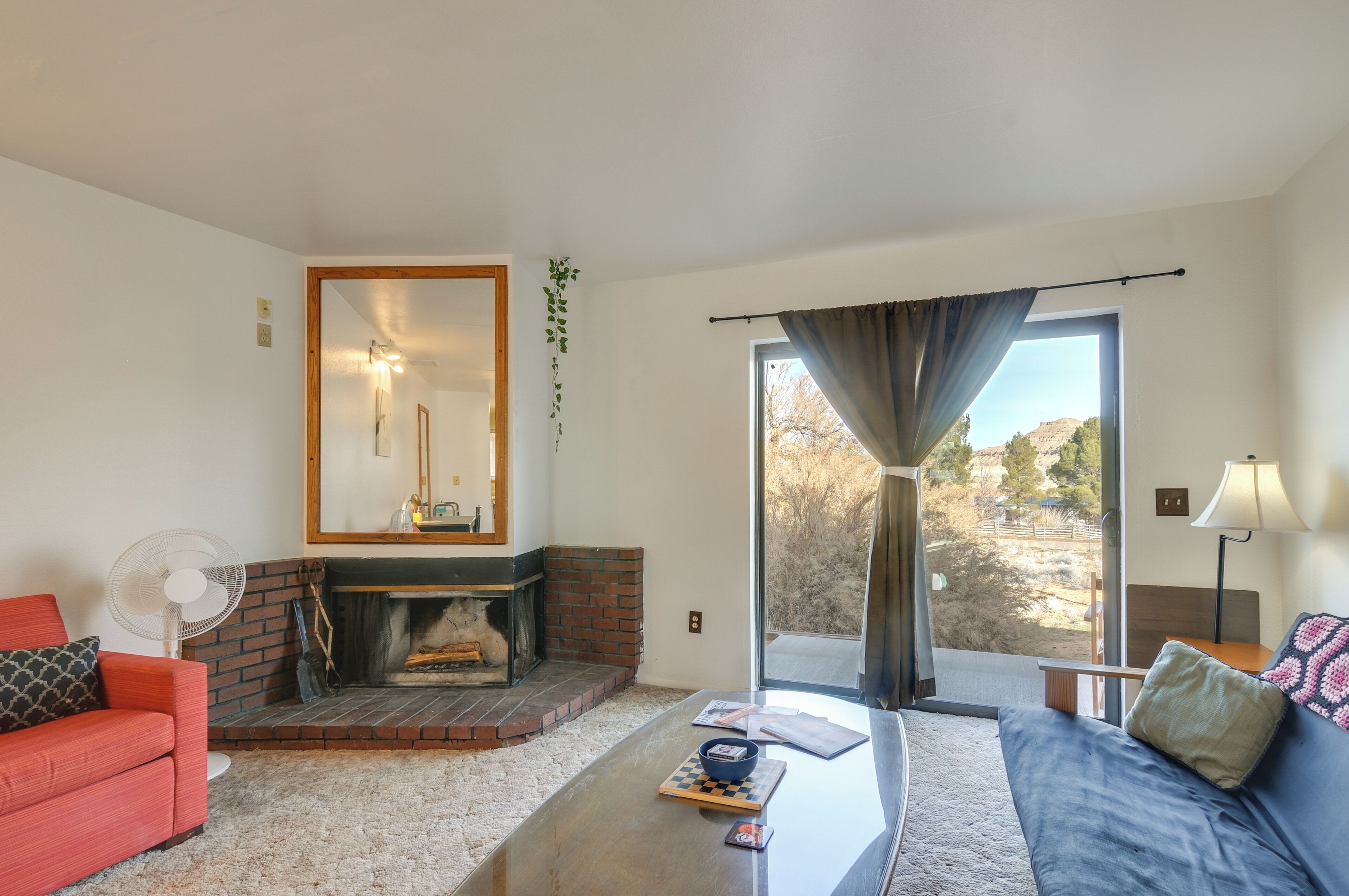 TV, fireplace, books