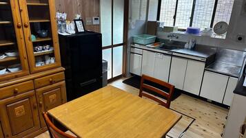 Fridge, microwave, cookware/dishes/utensils