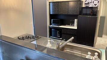 Fridge, microwave, stovetop, cookware/dishes/utensils