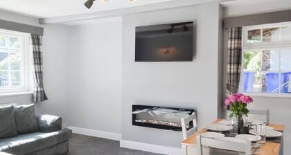 A beautifully restored single-storey two bedroom cottage sleeping four people.