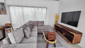 Deluxe Villa, Resort View, Poolside | Living area