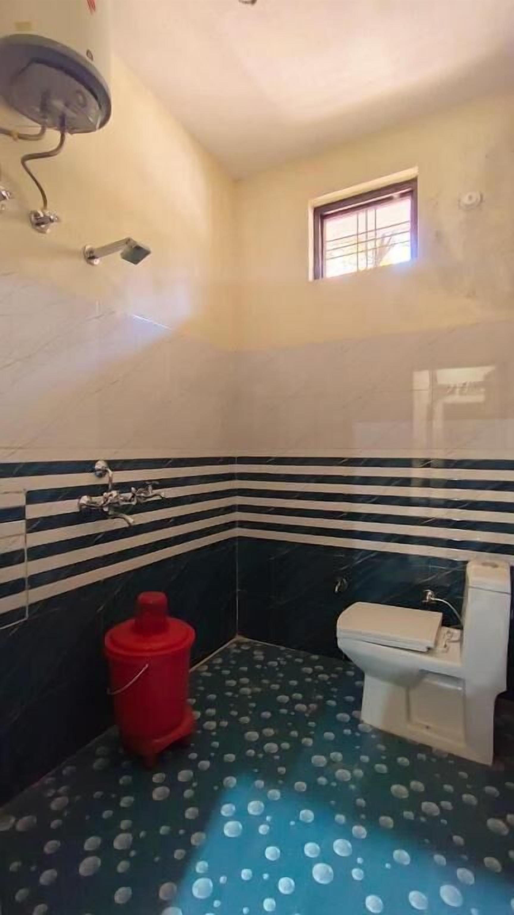 Shower, free toiletries, slippers, towels