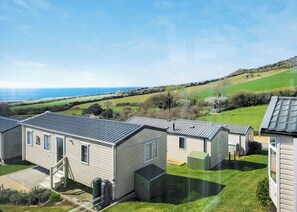 Exterior - This comfortable stylish caravan offers beautiful sea and country views. (Dorchester)