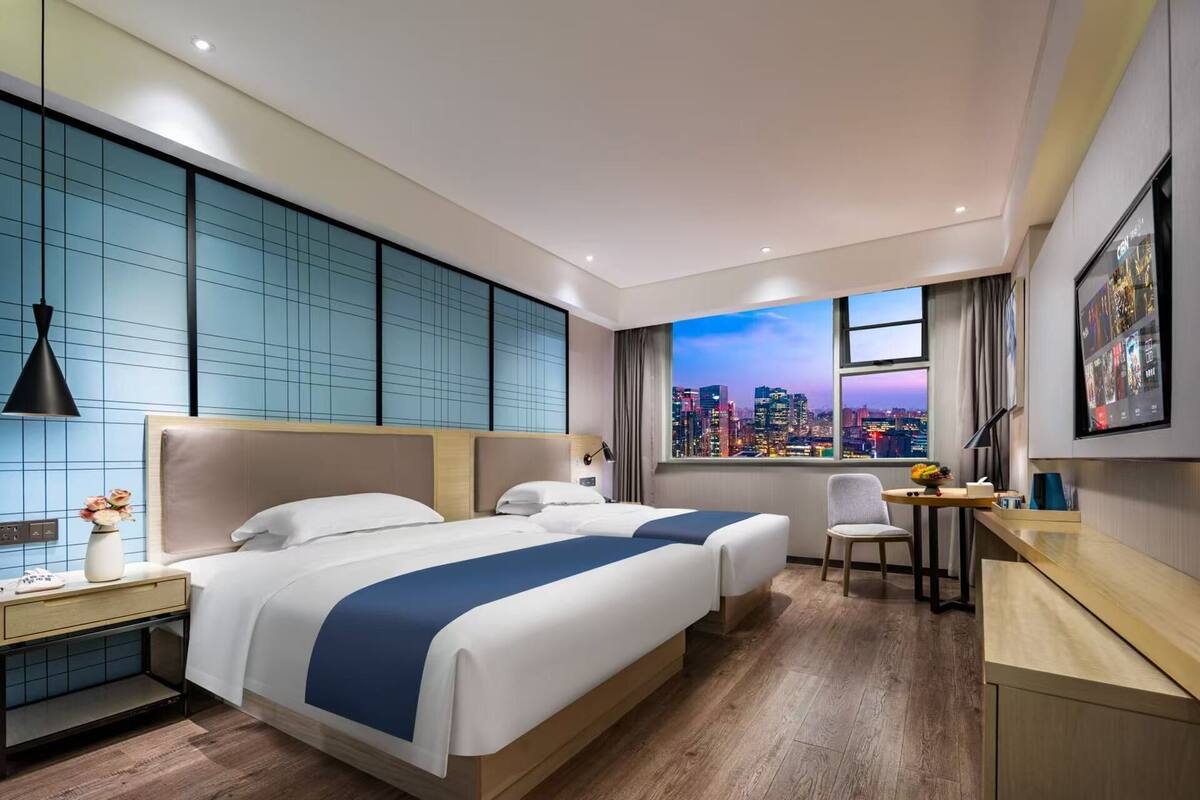 Premium bedding, down comforters, memory foam beds, desk