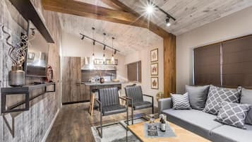 Apartamento Deluxe, vistas a la ciudad | Zona de estar