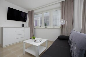 TV, offices - Bright Apartment with a Balcony | The Strict Centre of Warsaw (Warszawa)