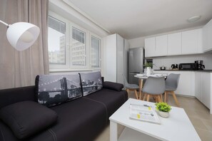 TV, offices - Bright Apartment with a Balcony | The Strict Centre of Warsaw (Warszawa)