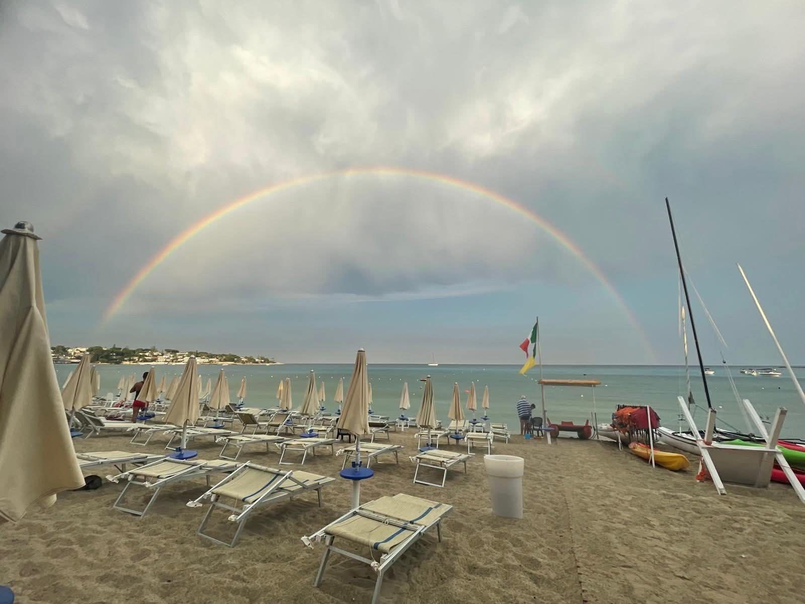 On the beach, sun-loungers