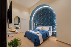 2 chambres, coffres-forts dans les chambres, fer et planche à repasser