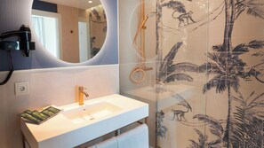 Shower, hair dryer, towels, soap