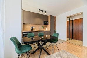 Apartment, Balcony, Mountain View | Dining - MoHost Blue Moon Apartments (Brasov)