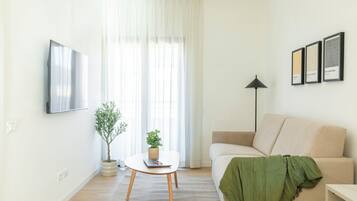 Apartment, 1 Bedroom, Terrace | Living area | TV