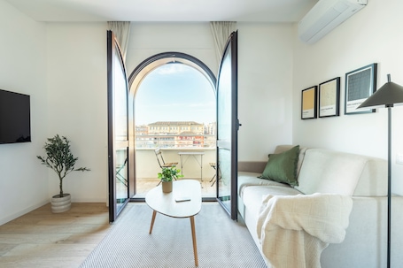 Apartment, 1 Schlafzimmer, Balkon | Wohnbereich | Fernseher. Líbere Rome San Lorenzo