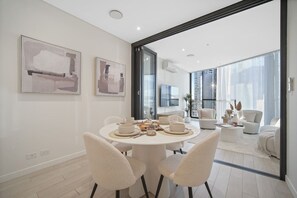 Dining - Bouclé Haven | 2BR, Sunset Skyline Views + Parking (Wentworth Point)