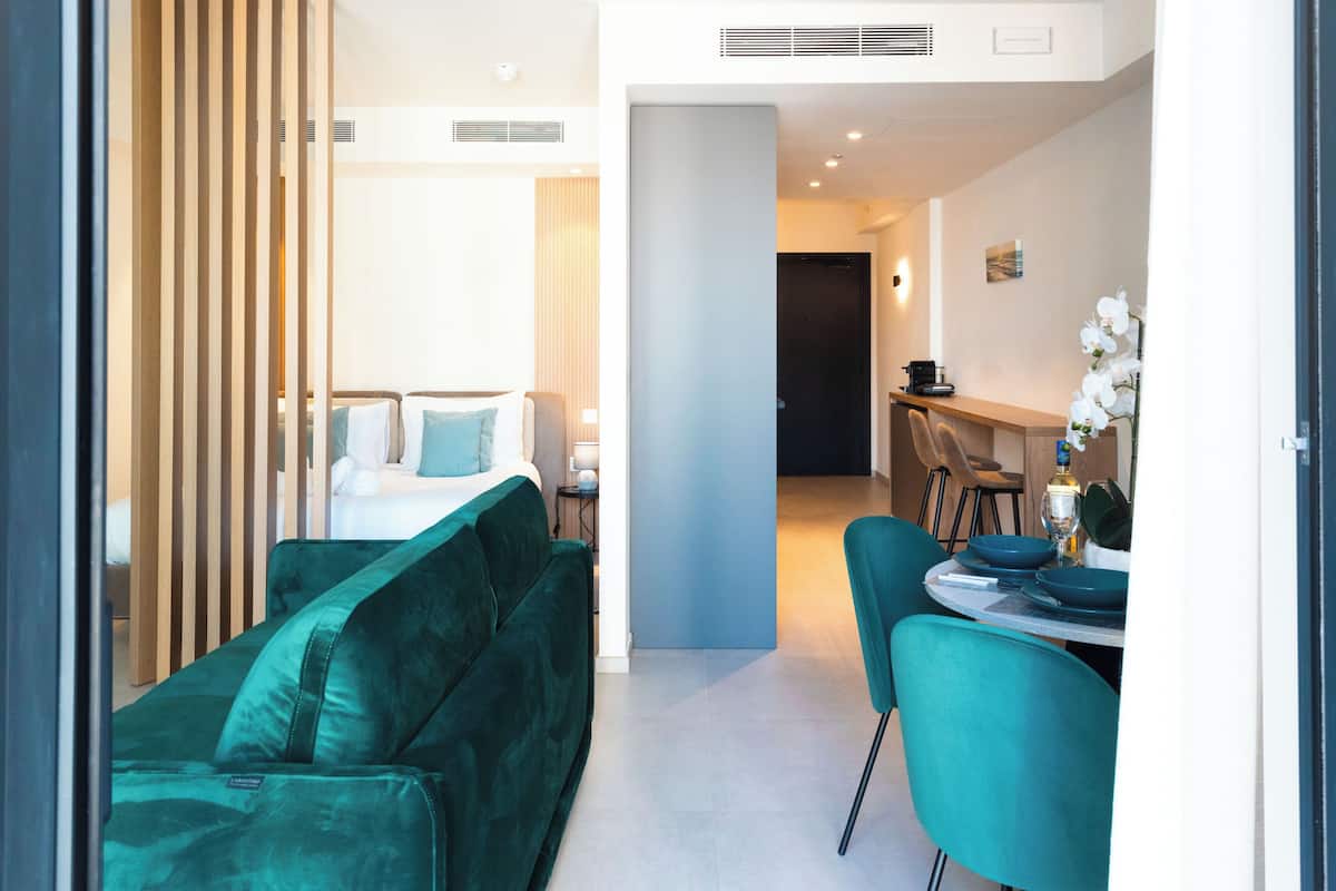 Basic Apartment, City View | Living area | TV