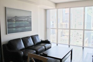 TV - RivetStays | The Atmos Gallery Suite - 1 Bedroom + Den Condo (Toronto)