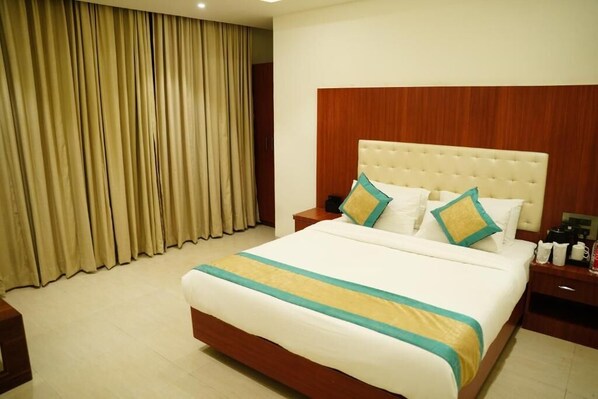 Deluxe Double Room, City View | In-room safe, desk, laptop workspace, soundproofing - Hotel Sai Krishna (Shirdi)