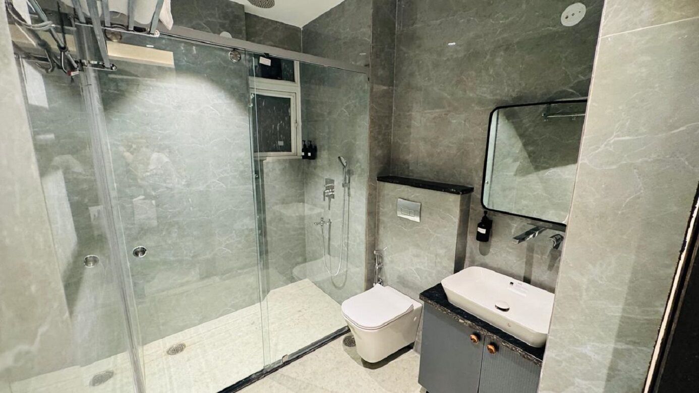 Toalhas de banho, sabonete, shampoo 