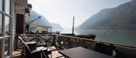 Traditional Bungalow, Balcony, Sea View | Outdoor dining