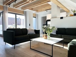 Die Idyllische | Wohnbereich | Fernseher, Kamin