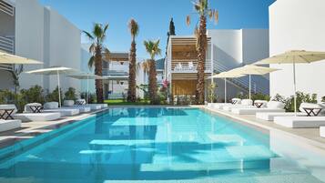 Seasonal outdoor pool, pool umbrellas, sun loungers