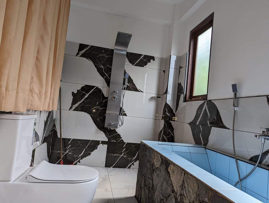 Luxury Double Room, Balcony, Mountain View | Bathroom | Separate bathtub and shower, hair dryer, towels, soap