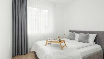 1 habitación, tabla de planchar con plancha, cuna de viaje y wifi