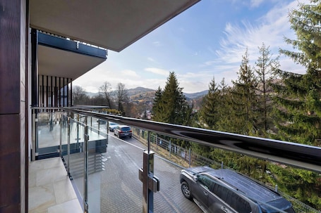 Property grounds. Cozy Apartment in Wisla | Balcony and Parking