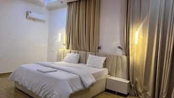 Economy Apartment, Balcony, City View | Desk, laptop workspace, blackout drapes, soundproofing